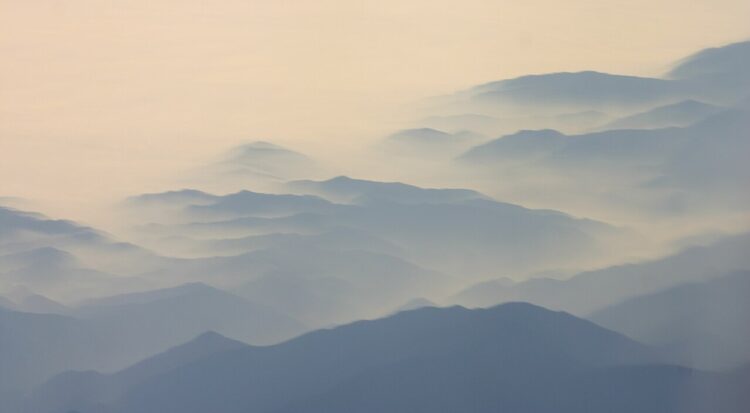 photo of misty mountains in California by Wing-Chi Poon
