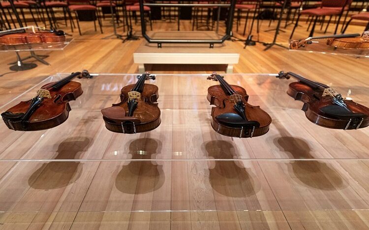 'Violin Vengeance': A Poem by Margaret Coats 1 photo of historic Violins of Hope on display (public domain)