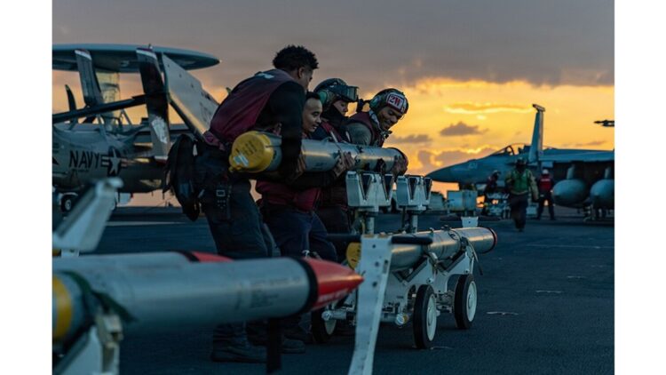 sailors on the USS Gerald R. Ford move ordinance in support attacks on Iran (US Military)