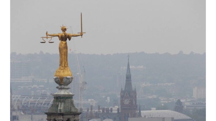 photo of Lady Justice in London by Chris Downer